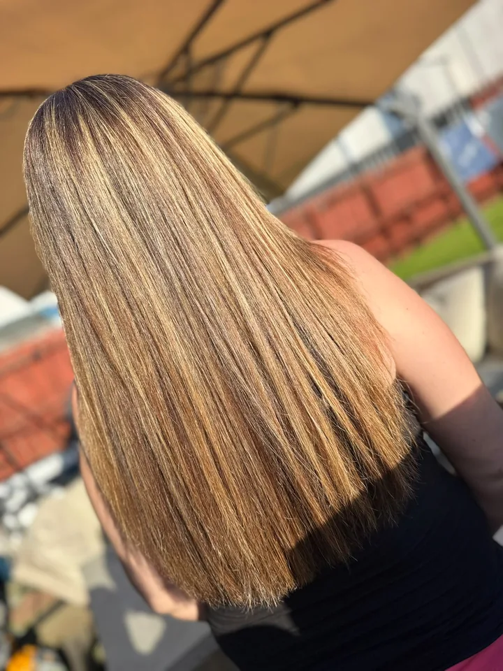 Caramel balayage on long, straight hair