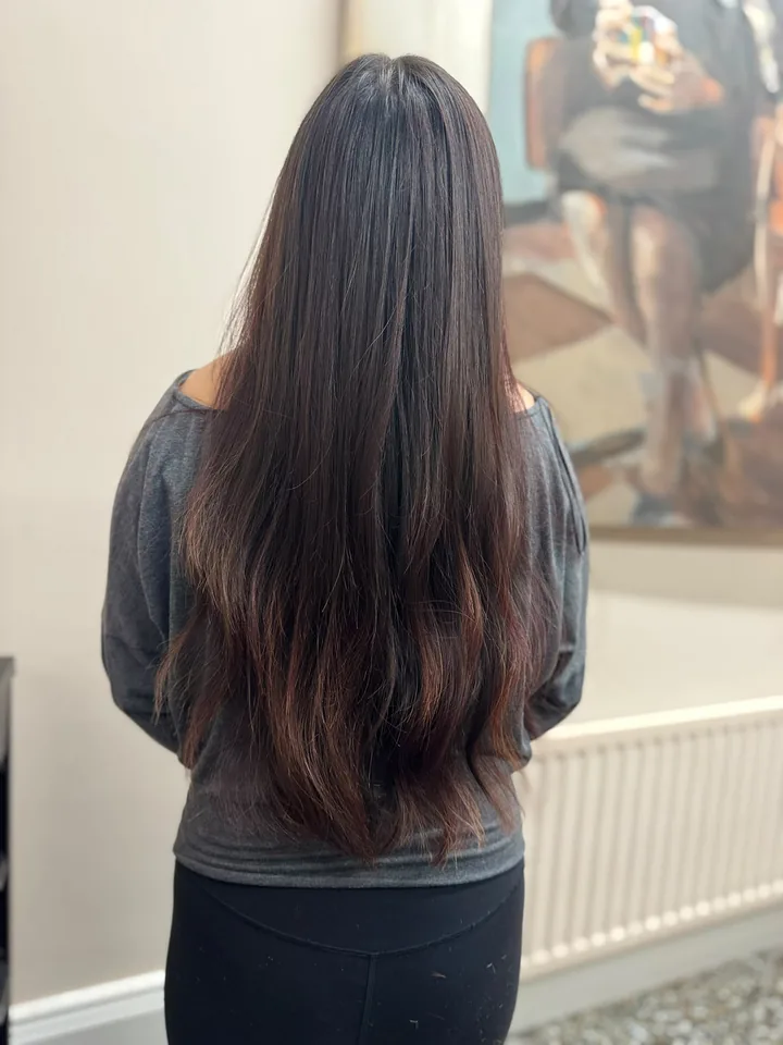 Long brunette hair cut with soft layers